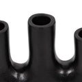 Close-up of black metal pipes on a white background