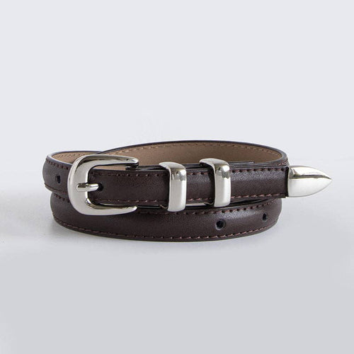 Brown leather belt with silver buckle and spike on a light gray background
