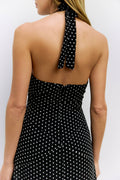 back close up of black and white polka dot dress.