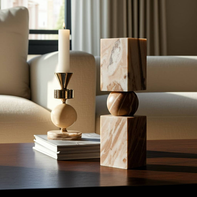 Decorative candle holder and wooden blocks on a table with a blurred background