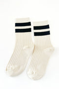 White socks with black stripes on a white background