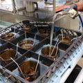 Manufacturing process with components being processed in a factory setting, featuring text 'Made in Los Angeles by our team.'