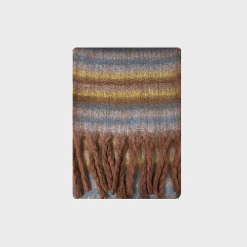 Striped scarf with fringes on a light gray background