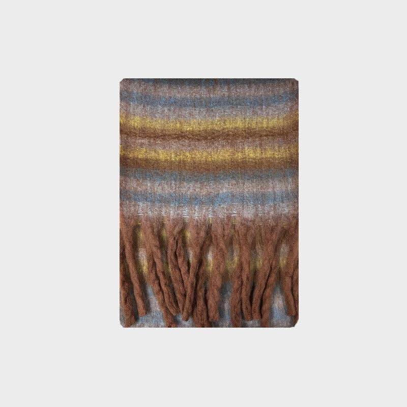 Striped scarf with fringes on a light gray background