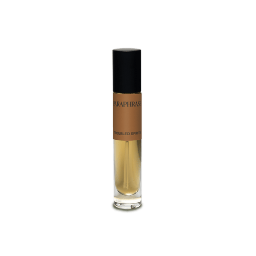 Perfume bottle with a brown label on a black background