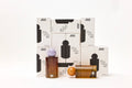 Perfume bottles and packaging with a white background
