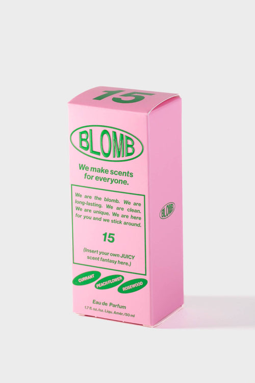 Pink box of Blombe perfume with green text on a white background