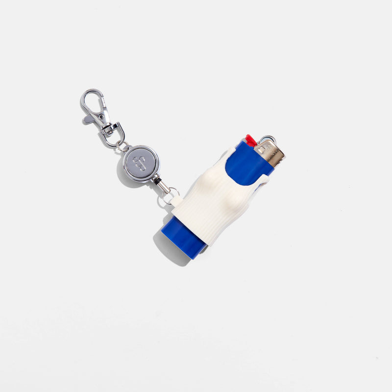 Keychain with a lighter attached on a white background