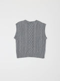 Gray knitted vest on a light gray background
