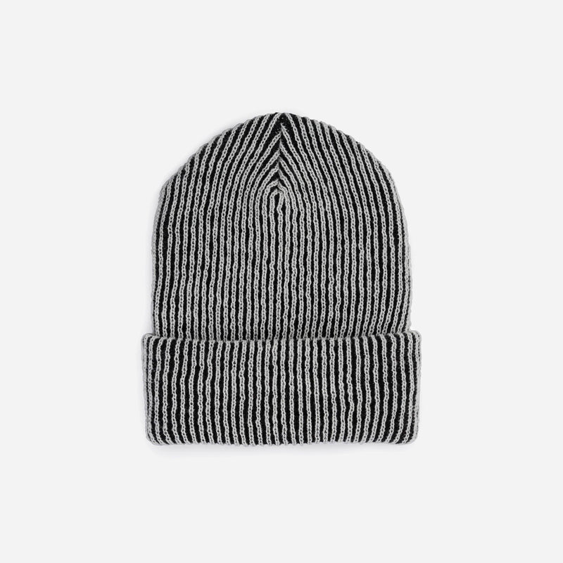 Striped beanie on a light gray background