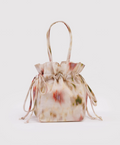 Floral patterned drawstring bag on a white background