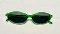 Green sunglasses with dark lenses on a white background