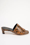 A single women's heeled mule sandal with a brown and black snakeskin pattern, shown from a side profile against a plain white background.