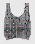 Reusable bag with a grid pattern on a light gray background