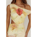 Woman wearing a floral dress with a white background