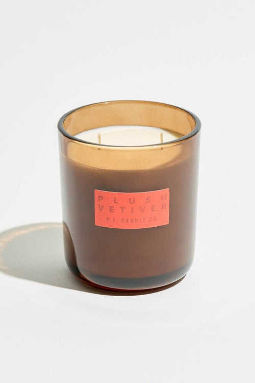 Candle with a label on a white background