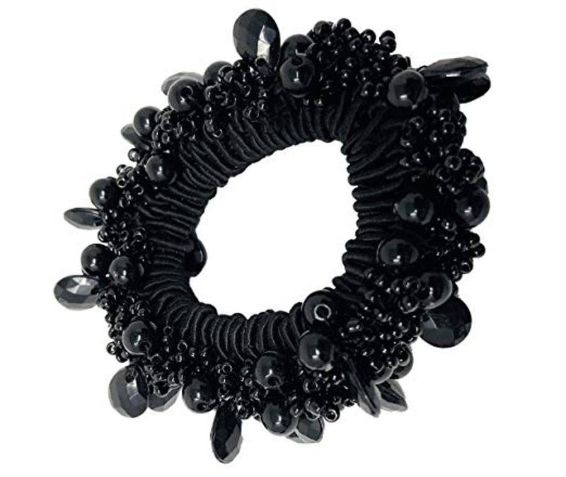 Black beaded scrunchie on white background