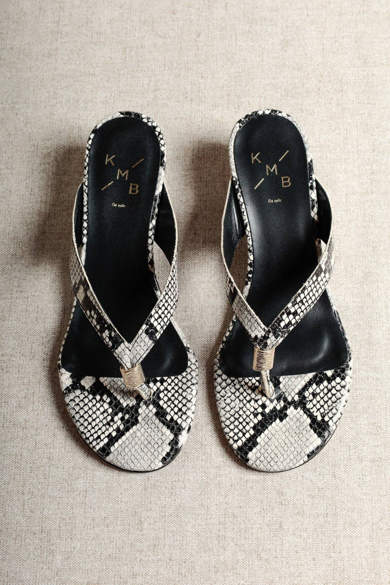 Aurora Snake-Embossed Leather Wedge Thong Sandals on white background