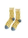 Pair of socks with a geometric pattern on a white background