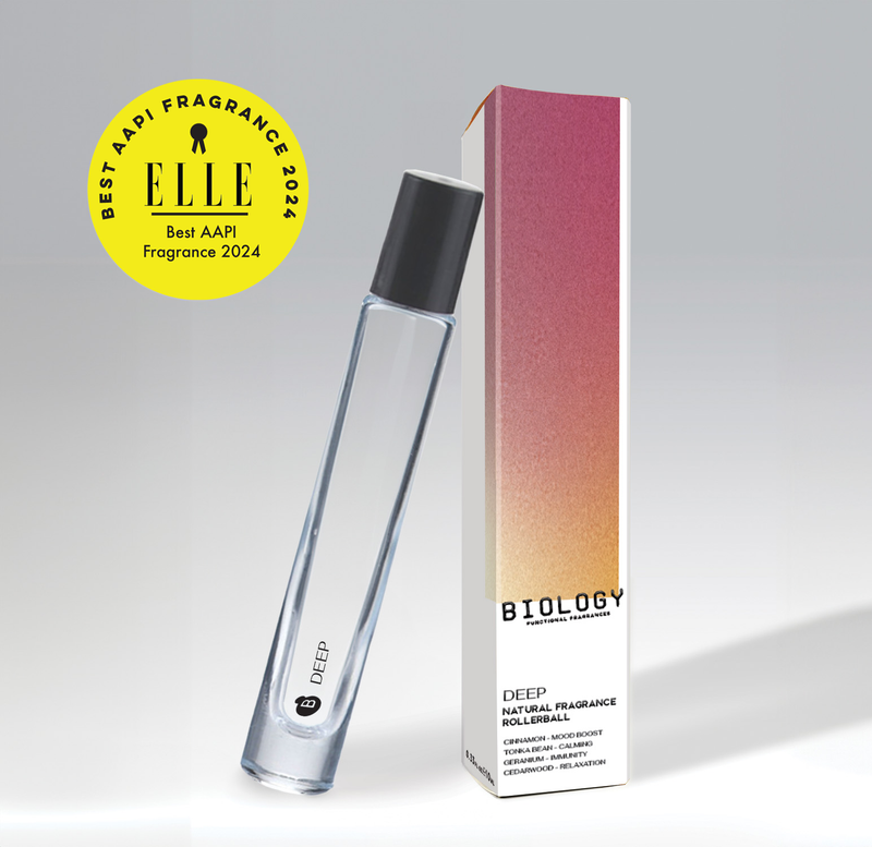 Perfume bottle and packaging with 'Elle' Best AAPI Fragrance 2024 award on a gray background